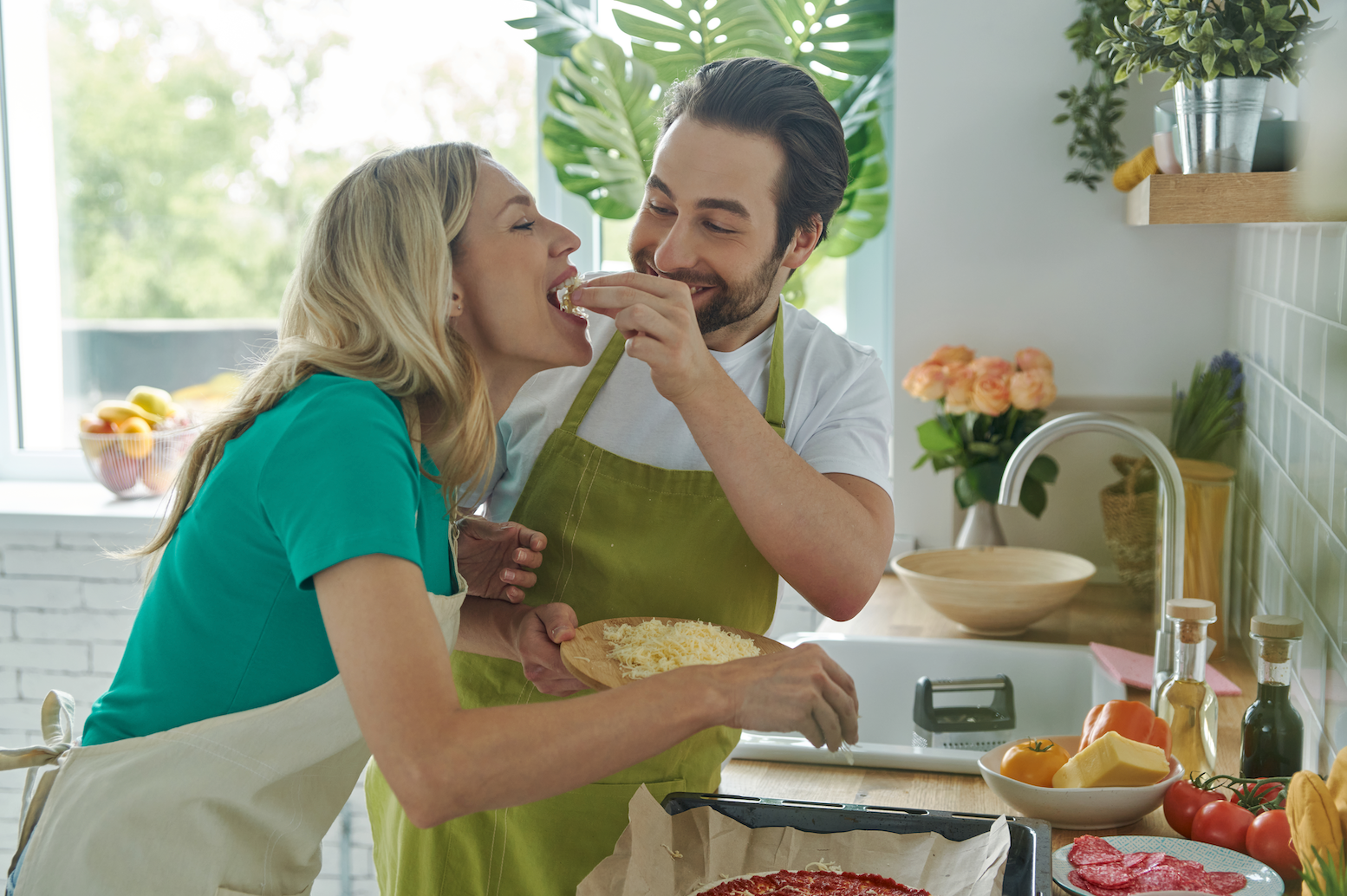 playful couple in the kitchen